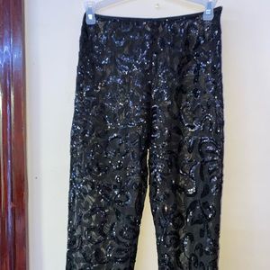 Black custom sequins mesh pants with slight bell bottoms